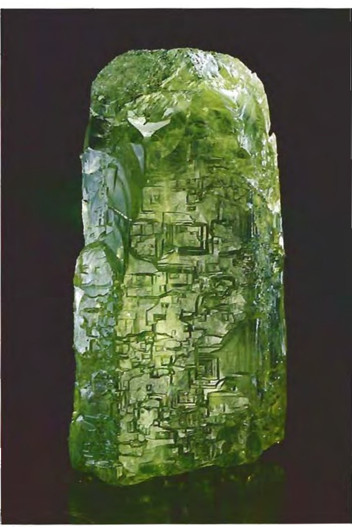 Hydrothermally etched green beryl crystal