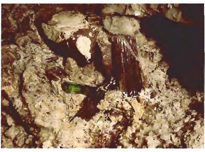 In-situ open gem pocket with tourmaline and quartz crystals