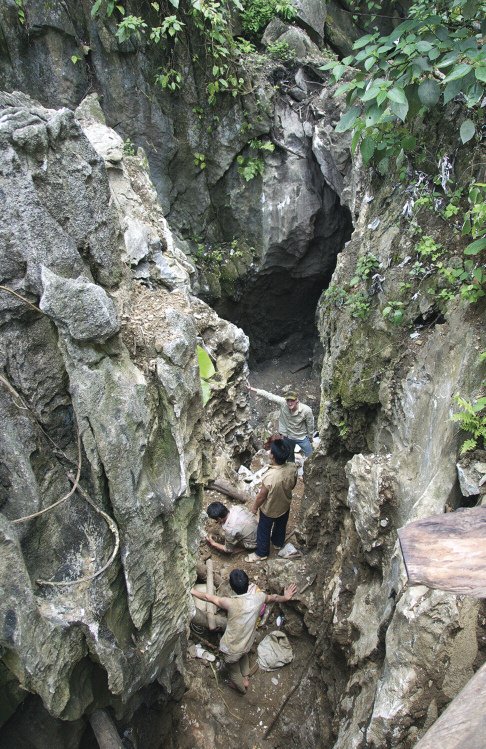 Hazardous karst crevasse mining in marble towers