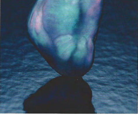 Adularescence in fine moonstone cabochon